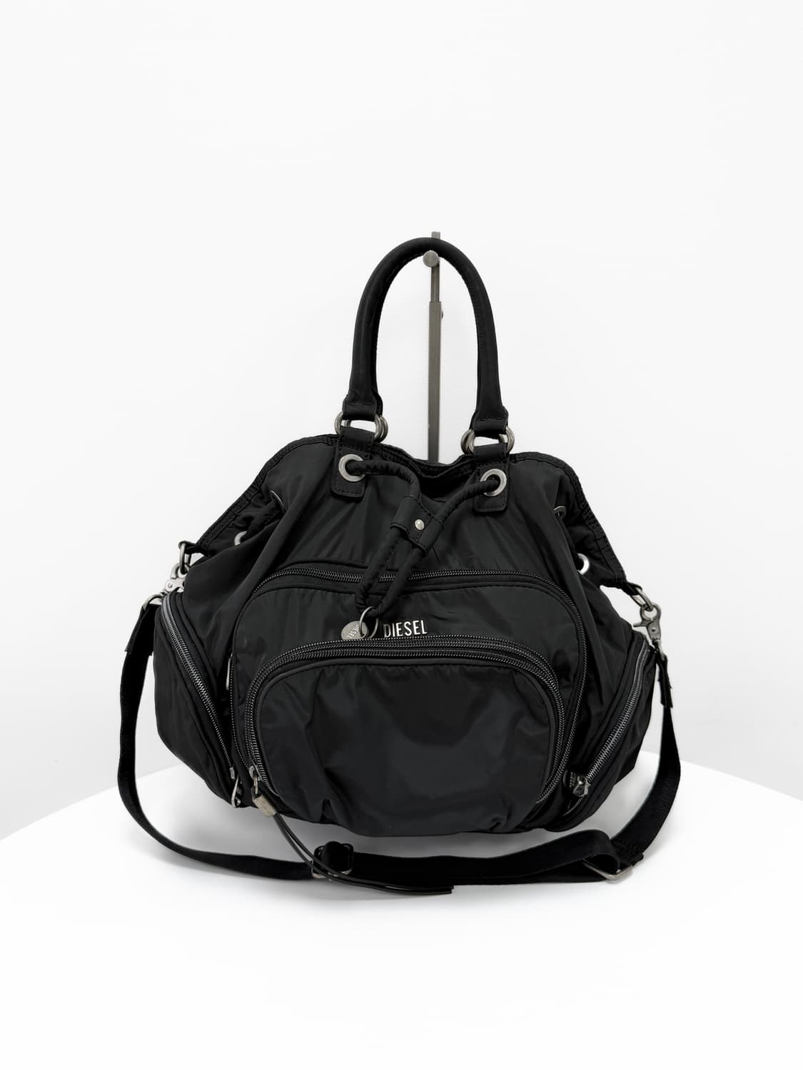 디젤 드로스트링 나일론 멀티 포켓 3-Way 백 상품이미지1