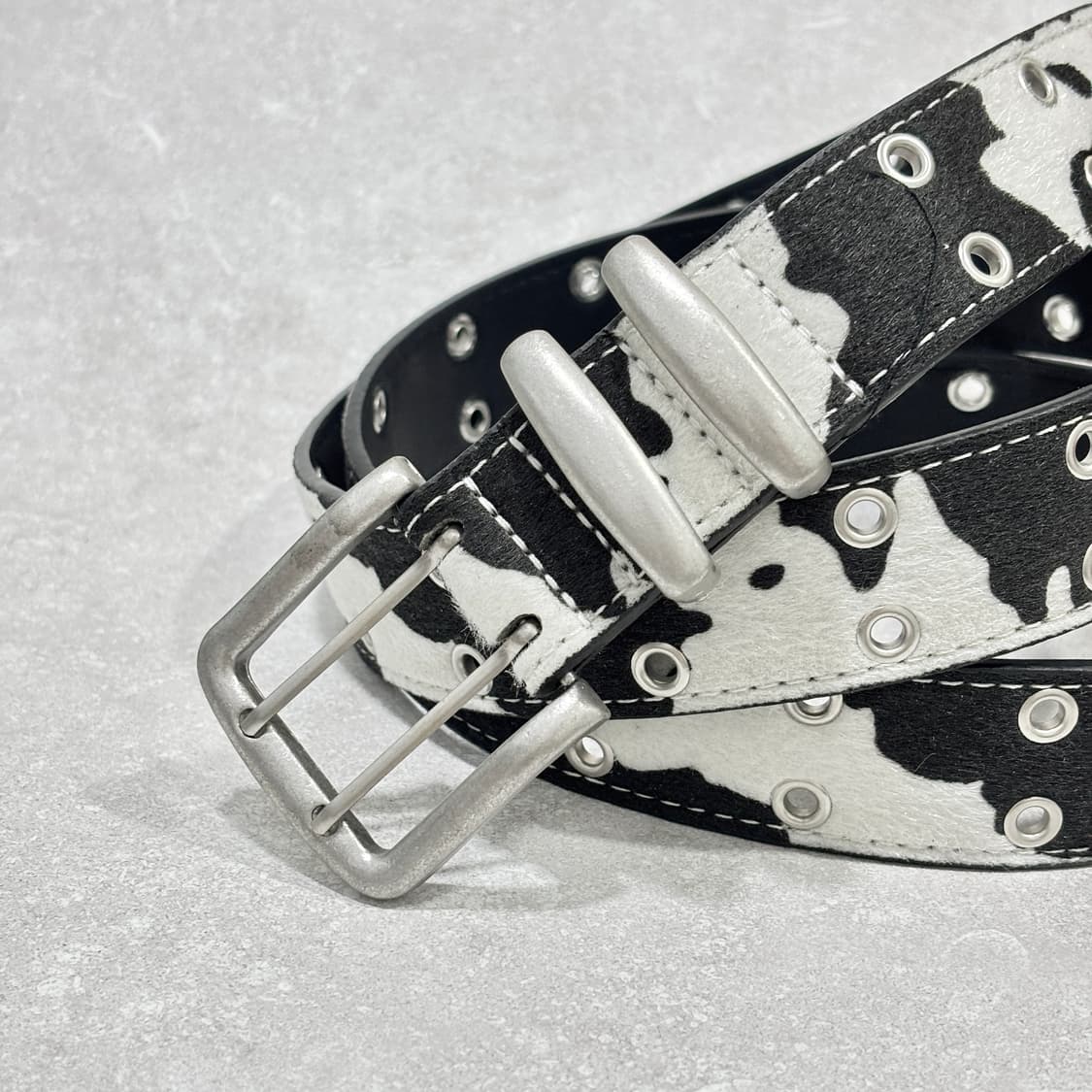 Oribell 스포티드 카우 송치털 아일렛 스터드 롱 벨트 상품이미지8