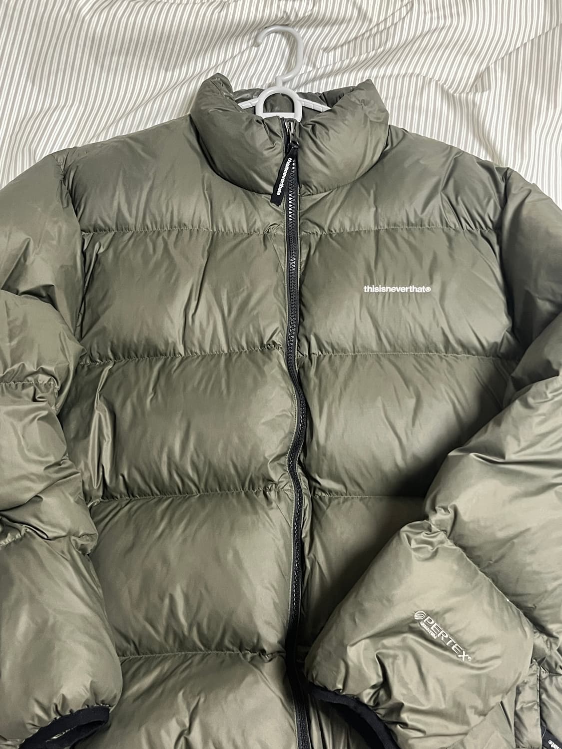디스이즈네버댓 패딩 카키 올리브색 경량패딩 상품이미지1