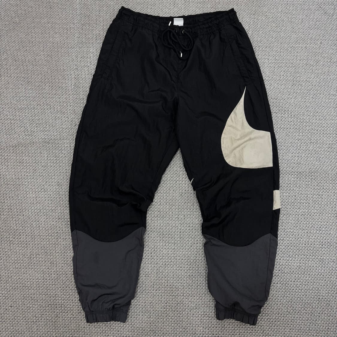 Nike NSW 스우시 우븐 라인드 팬츠 상품이미지1