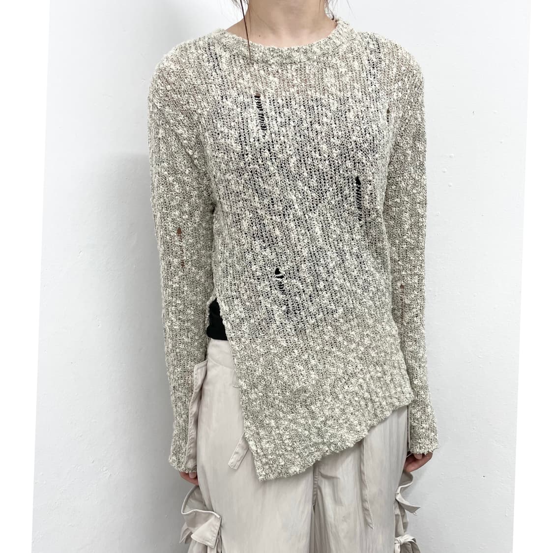 멜란지 데미지 루즈 절개 니트탑 상품이미지1