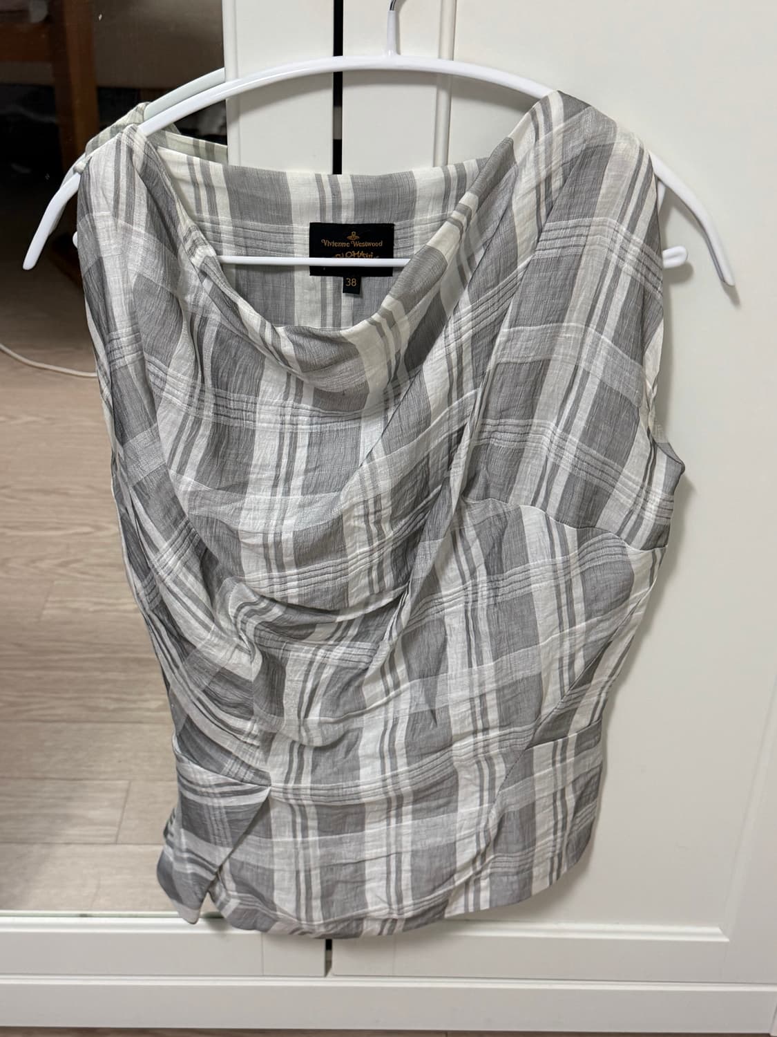 비비안 웨스트우드 슬리브리스 블라우스 상품이미지1