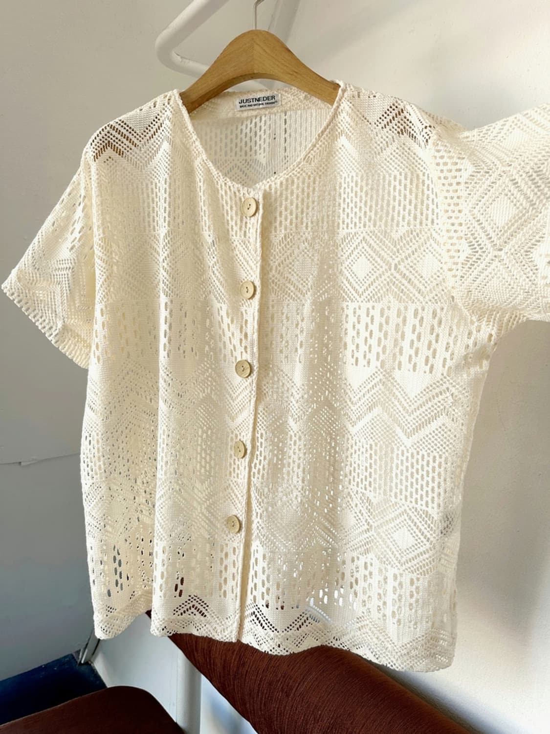 Cotton blend punch knit button top 상품이미지1