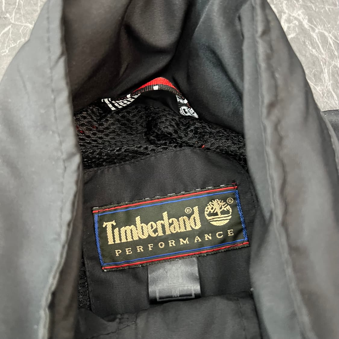 팀버랜드 로고 비대칭 지퍼 하이넥 바람막이 자켓 상품이미지4