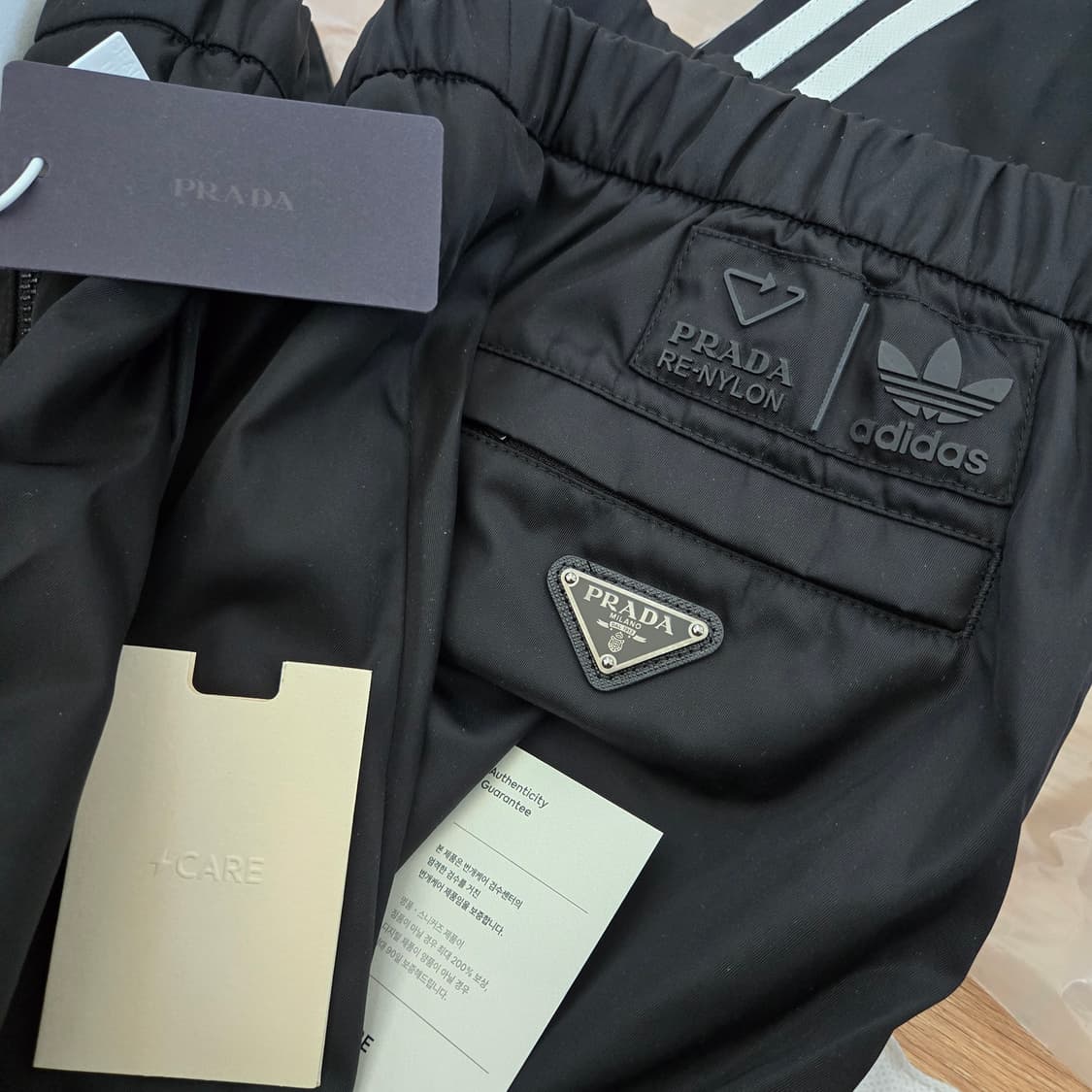 새상품 NFC정품 프라다 X 아디다스 리나일론 팬츠 블랙 xs 상품이미지1