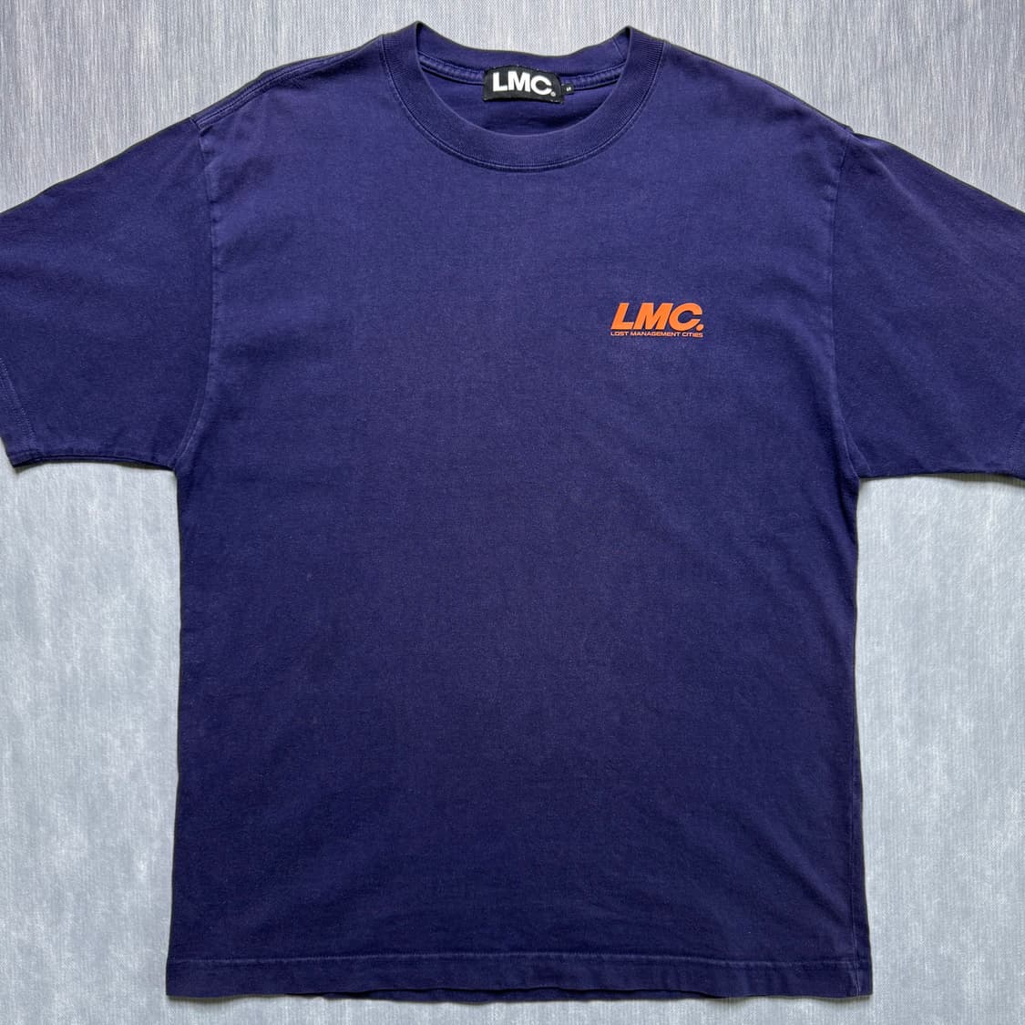 LMC 백프린팅 반팔티 (네이비/오렌지 로고) 상품이미지1