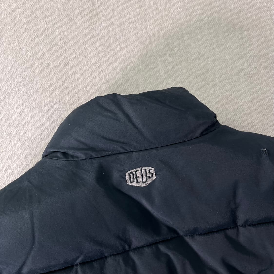 100 데우스엑스마키나 푸퍼 패딩 조끼 상품이미지6