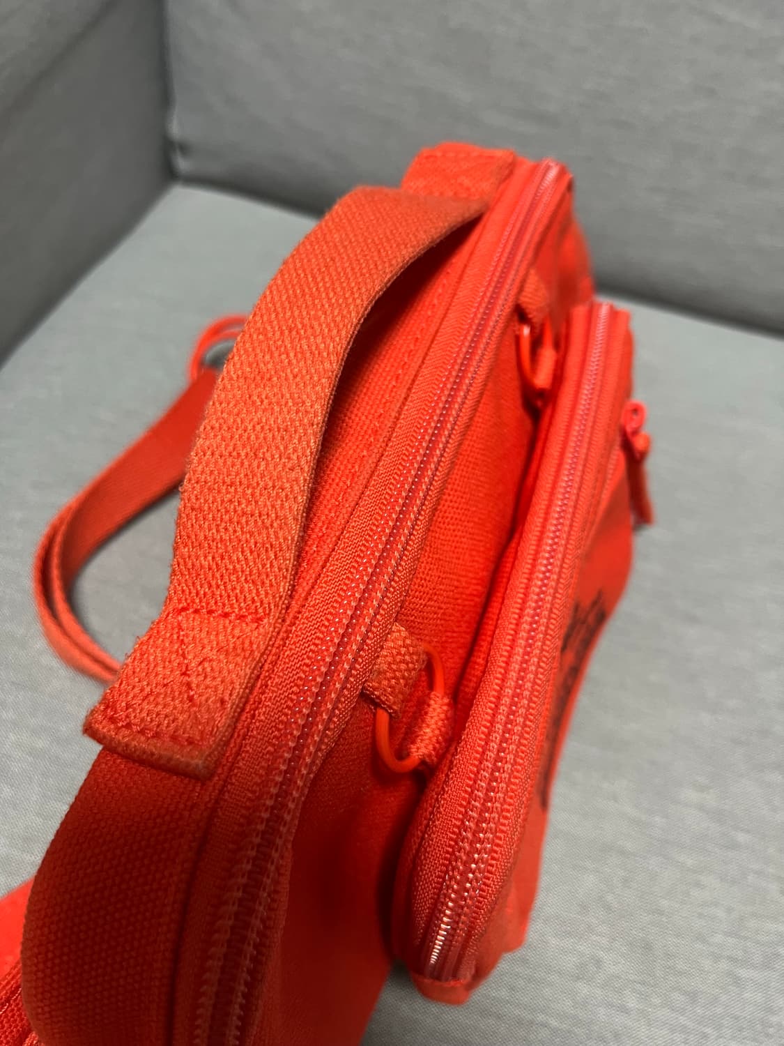 라프시몬스x이스트팩 루프링 웨이스트백 오렌지컬러 상품이미지9