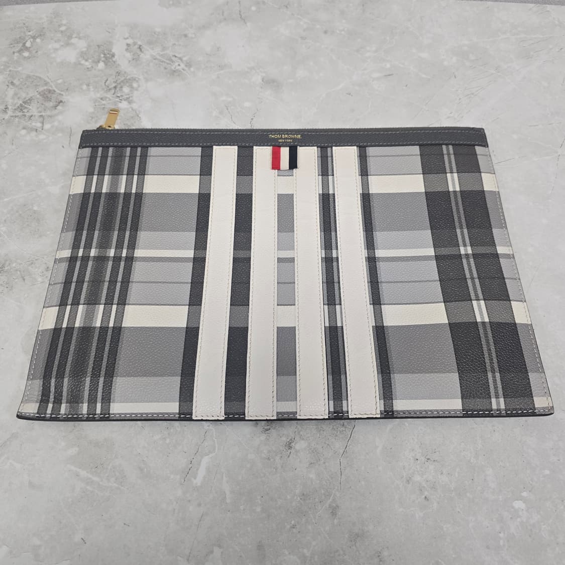 톰브라운 사선 체크 클러치 판매 상품이미지1