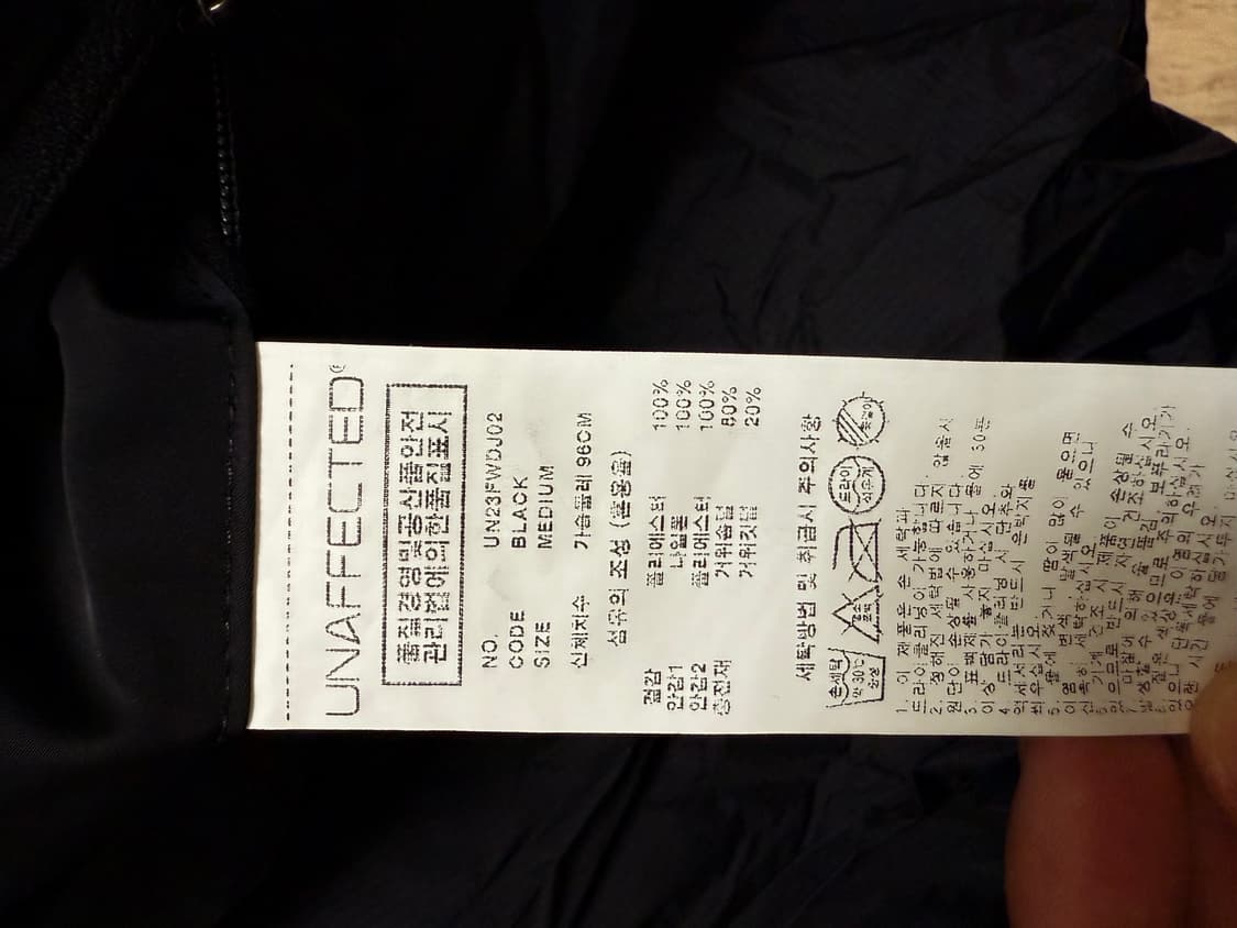 [M] 언어펙티드 웜 엠브레이스 구스다운 점퍼 블랙 상품이미지6