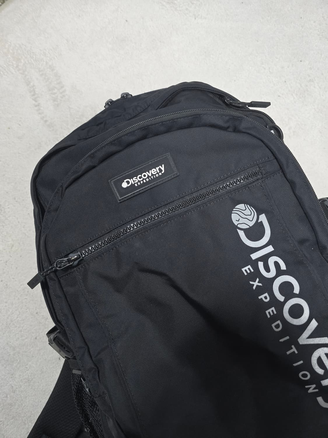 디스커버리 23FW 익스페디션 검정 백팩 31L 상품이미지1