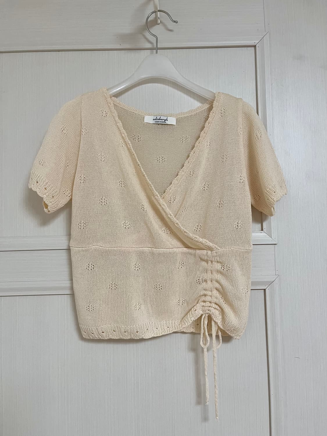 에딘버러 핑크 아이보리 펀칭 랩 니트 크롭 가디건 상품이미지1