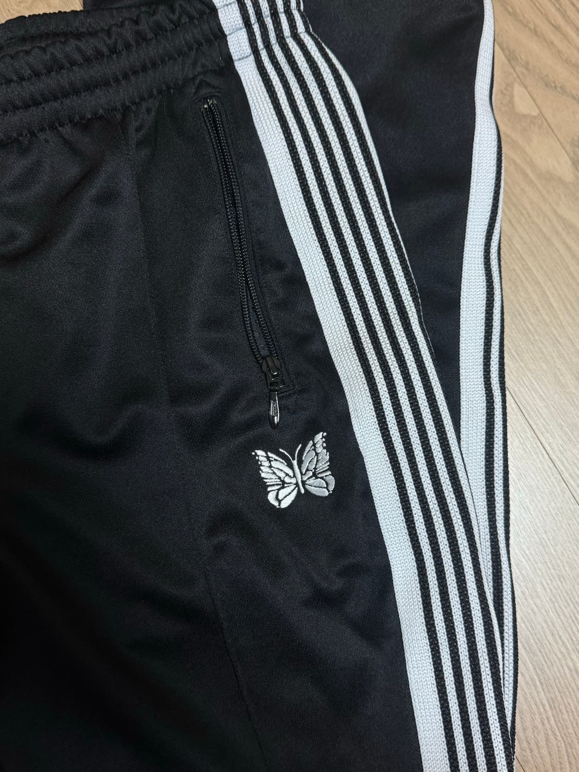 니들스 트랙팬츠 네로우  상품이미지1