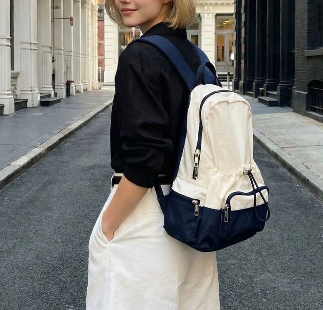 아이보리 색상과 네이비 색상이 배색된 스트링 백팩 상품이미지6