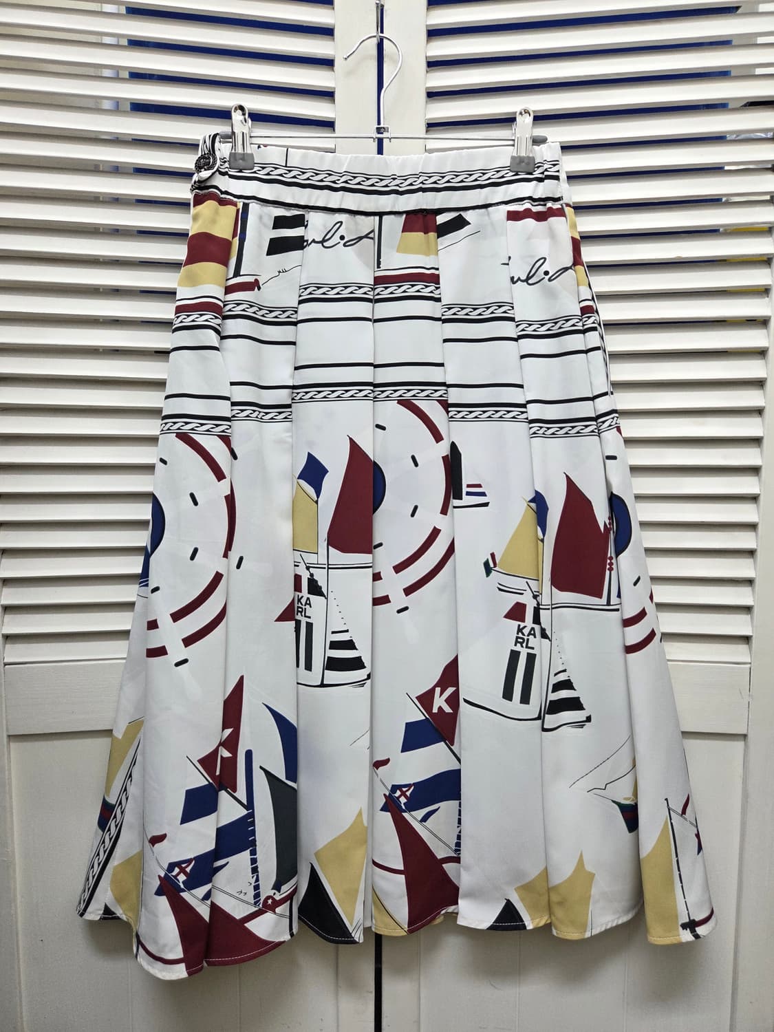 칼라거펠트 패턴 플리츠 스커트 상품이미지1