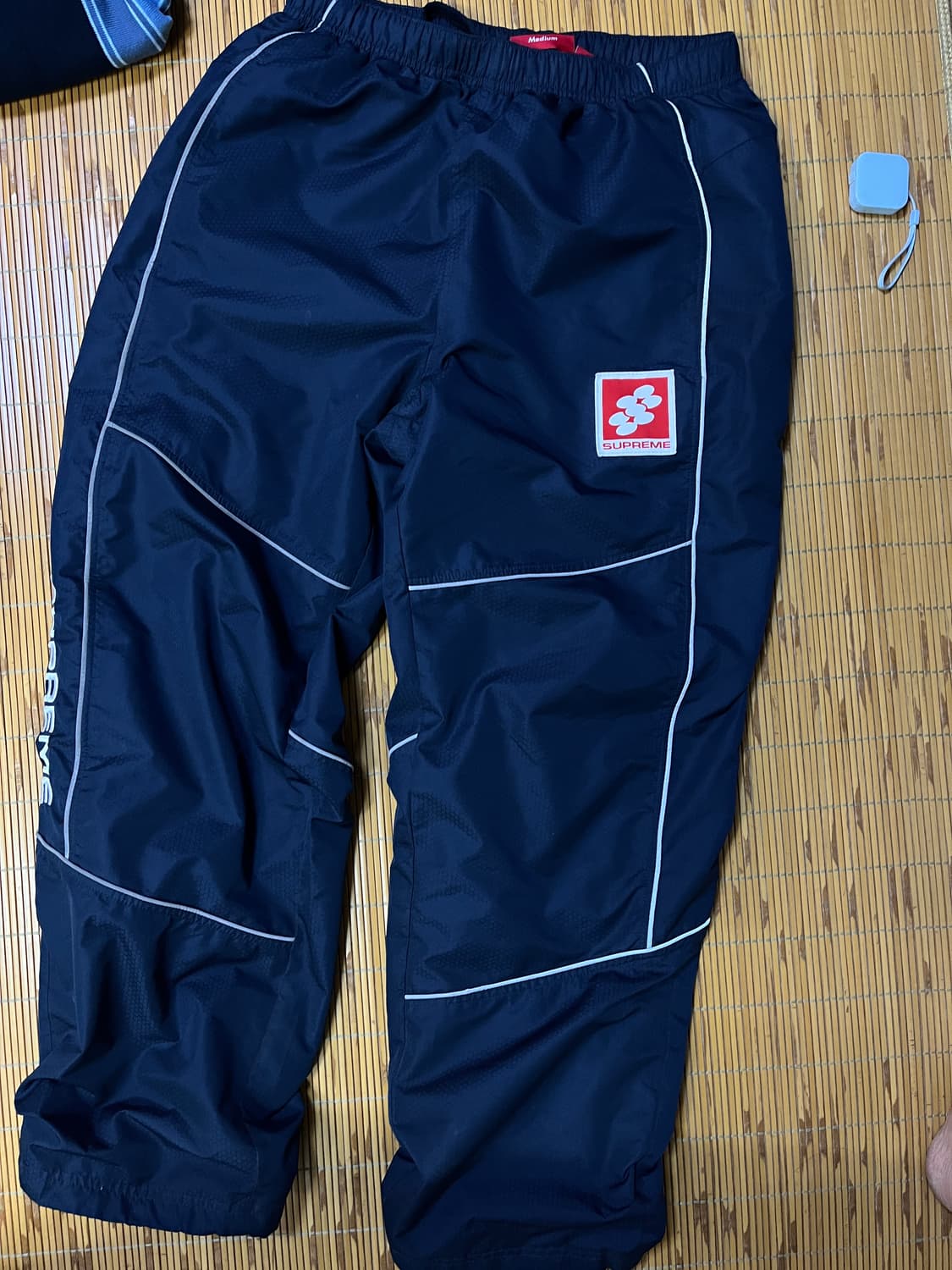 Supreme reflective piping track pants 상품이미지1