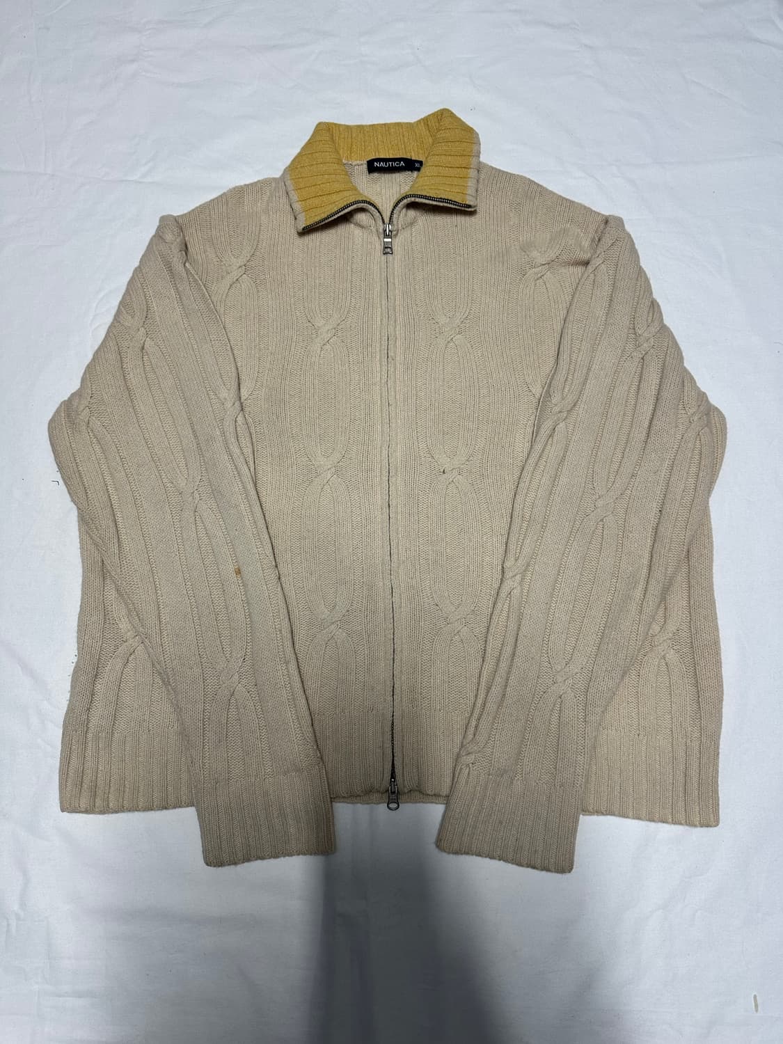 노티카 니트 집업 상품이미지1