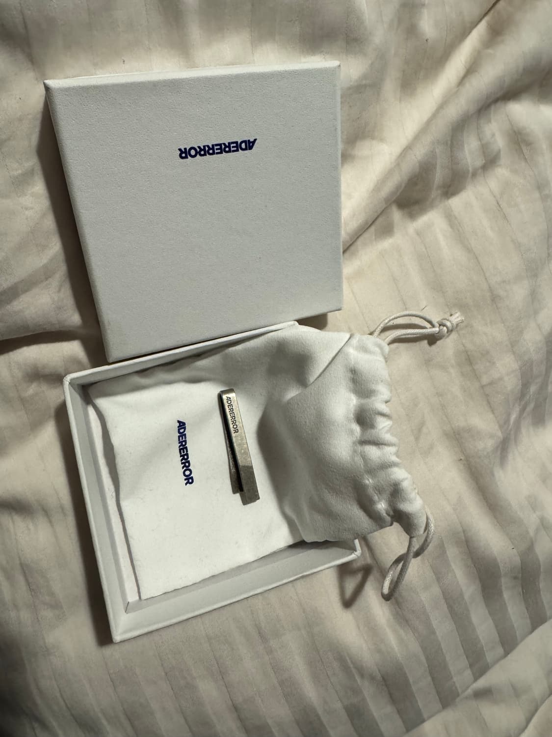 아더에러 타이 바 product. 100 상품이미지1