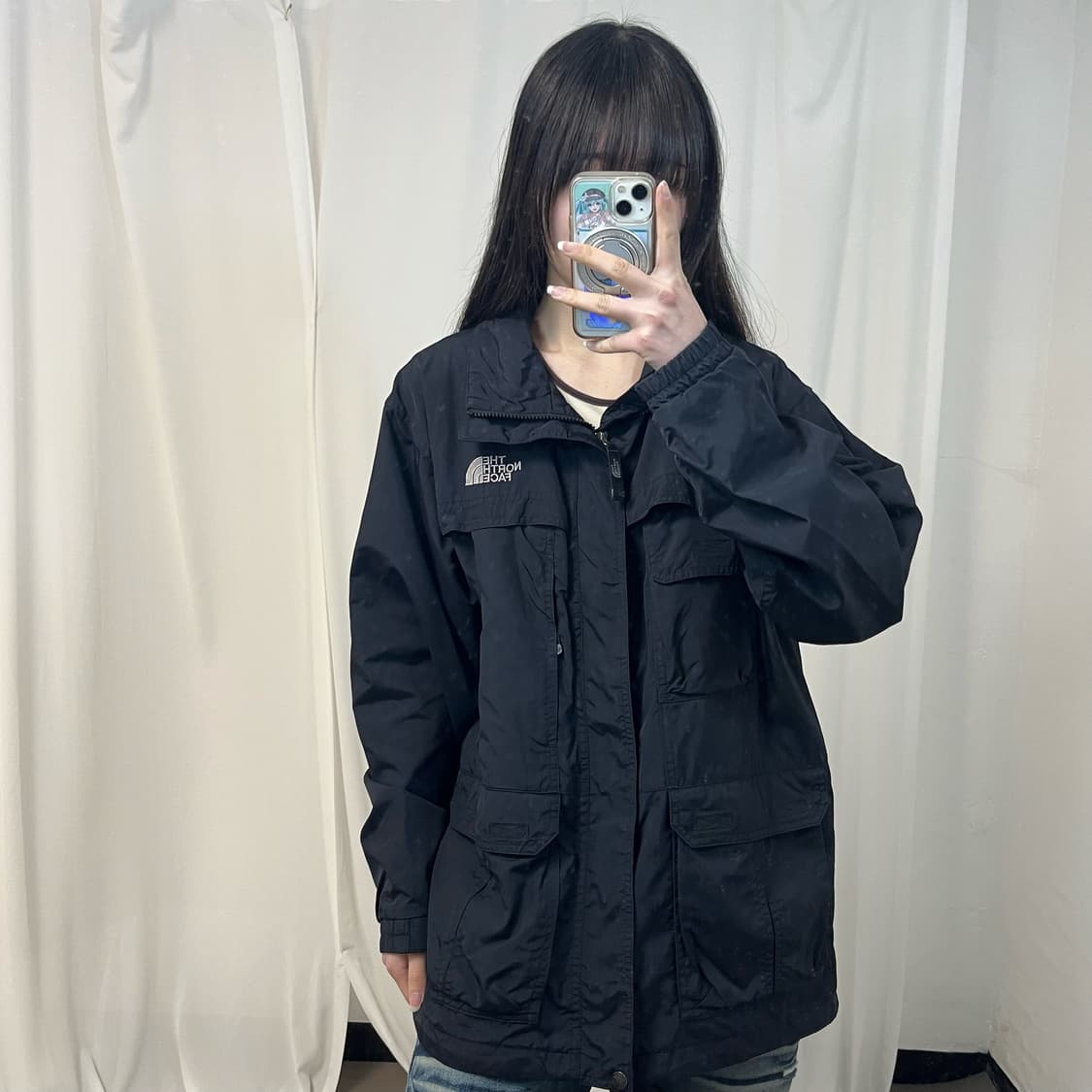 The North Face black windbreaker 상품이미지1