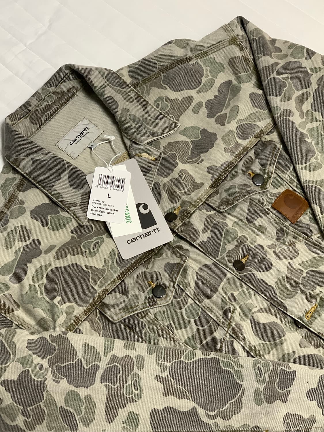 [L] 칼하트 WIP 덕 헬스턴 자켓 카모 덕 블랙 블리치드 상품이미지1