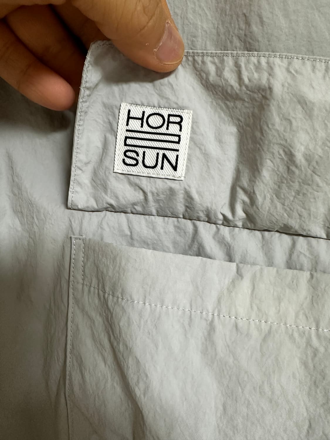 (L) 홀리선 브리즈 후드 바람막이 자켓 - 라이트 그레이 상품이미지3