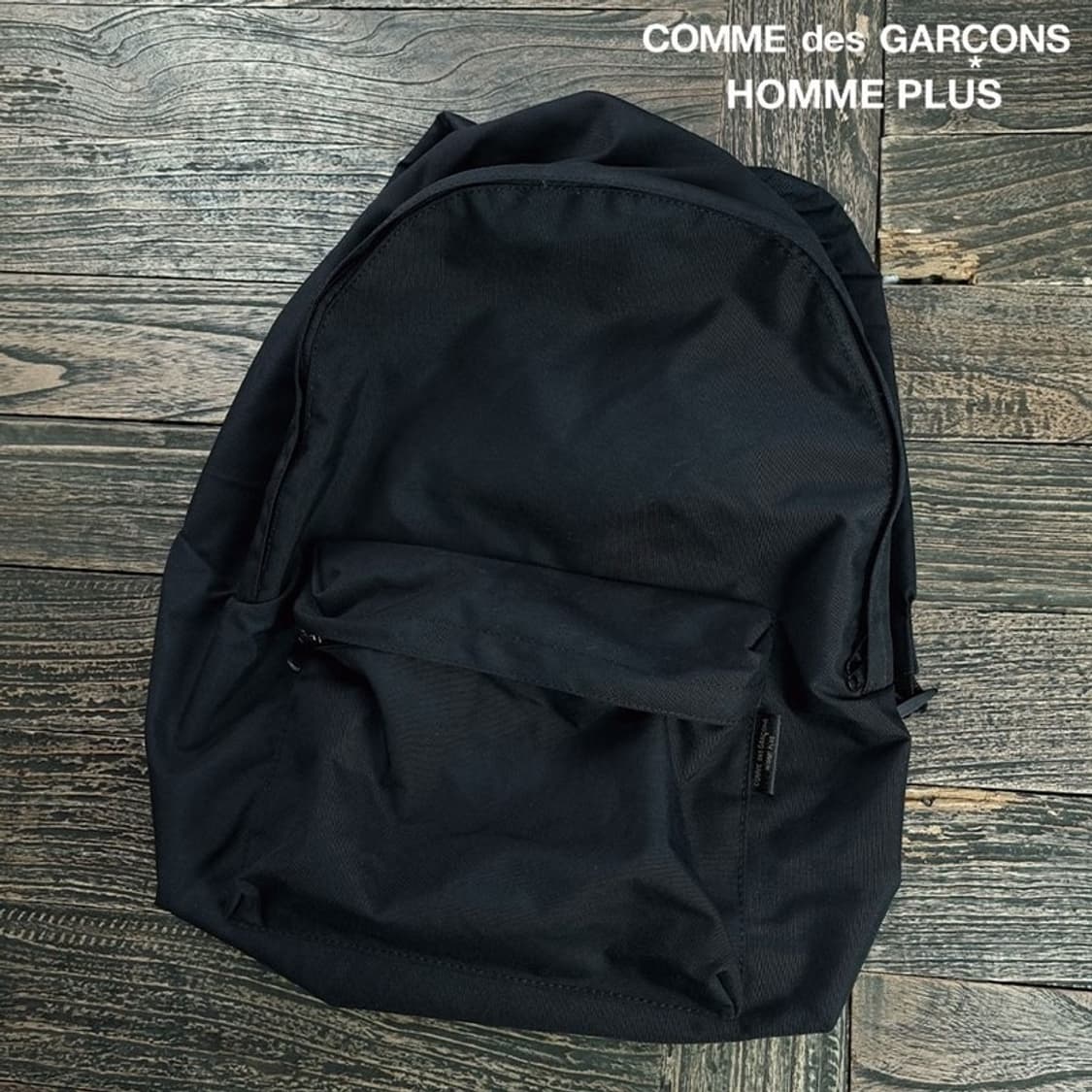 [꼼데가르송 옴므 플러스] 미니멀 백팩 블랙 P01611 상품이미지1