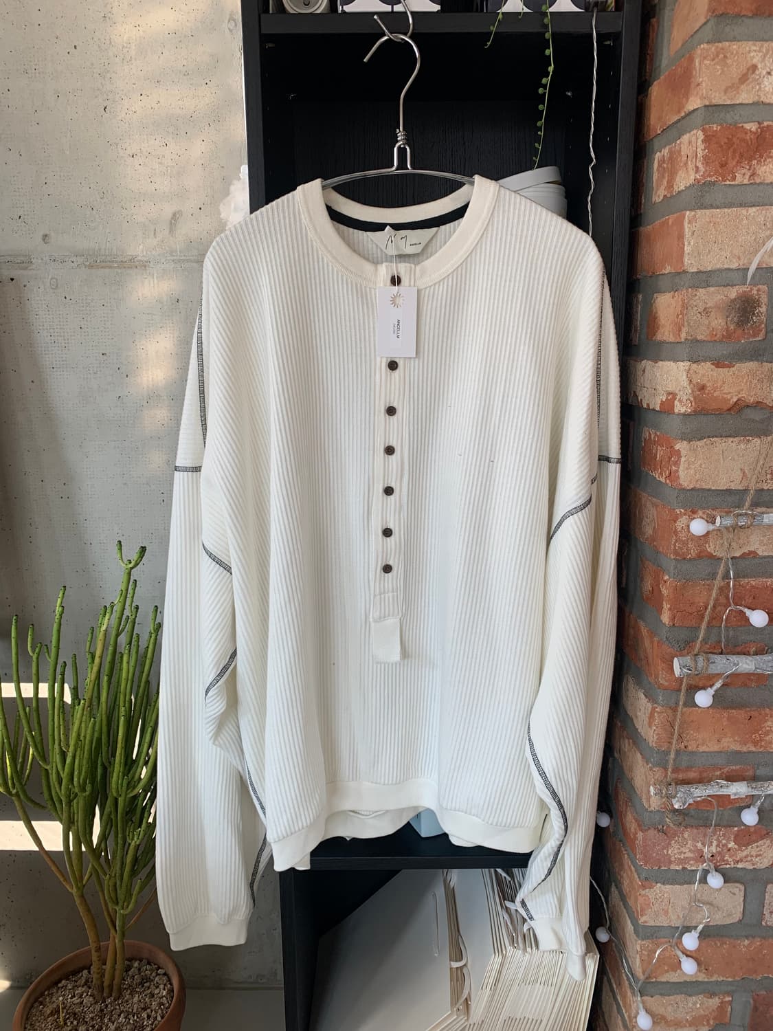 Ancellm 안셀름 오버사이즈 헨리 레일니트 슬리브 상품이미지1