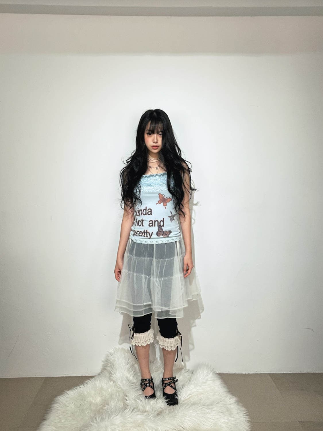 스카이블루 나비 프린팅 슬리브리스 상품이미지1