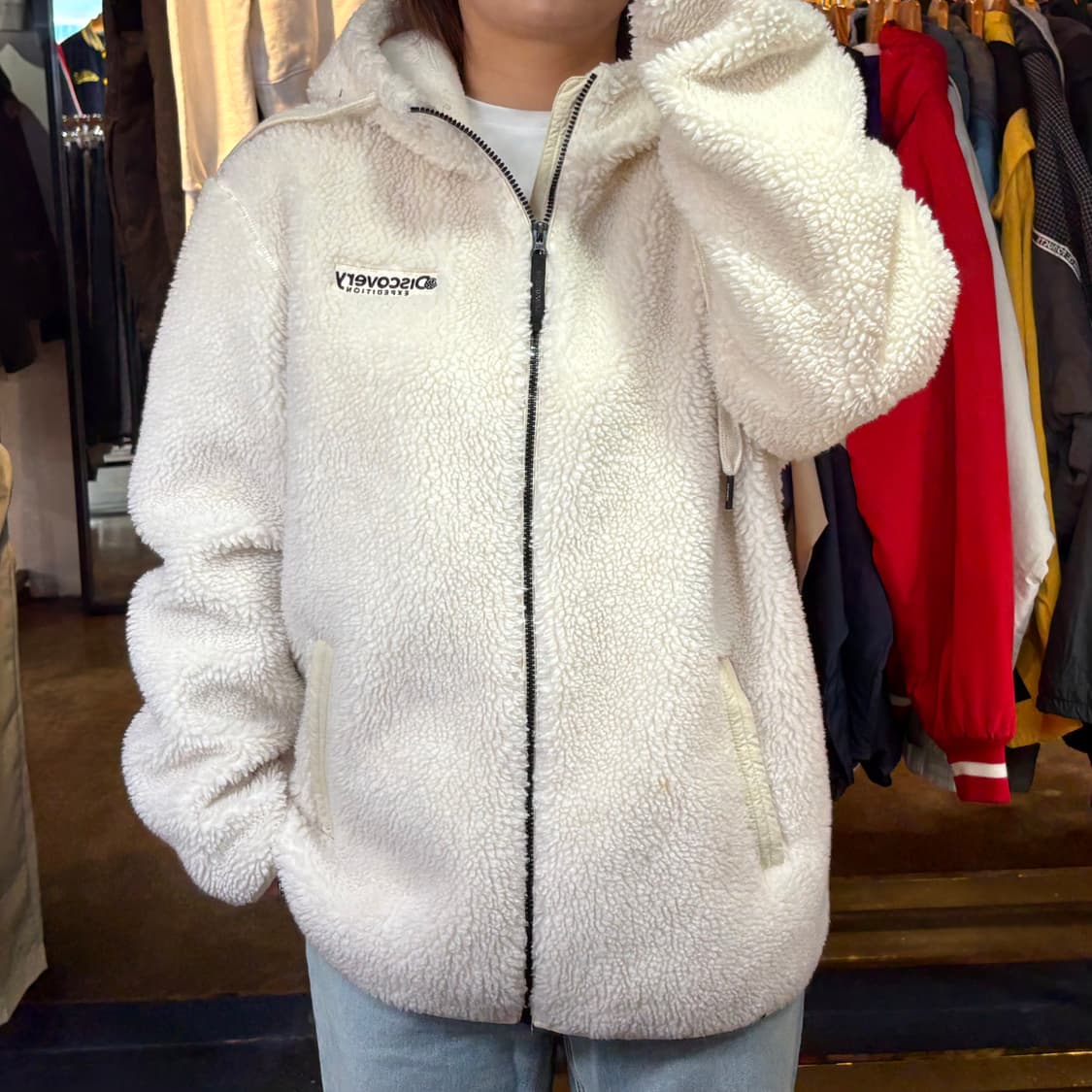 디스커버리 화이트 플리스 점퍼 상품이미지1