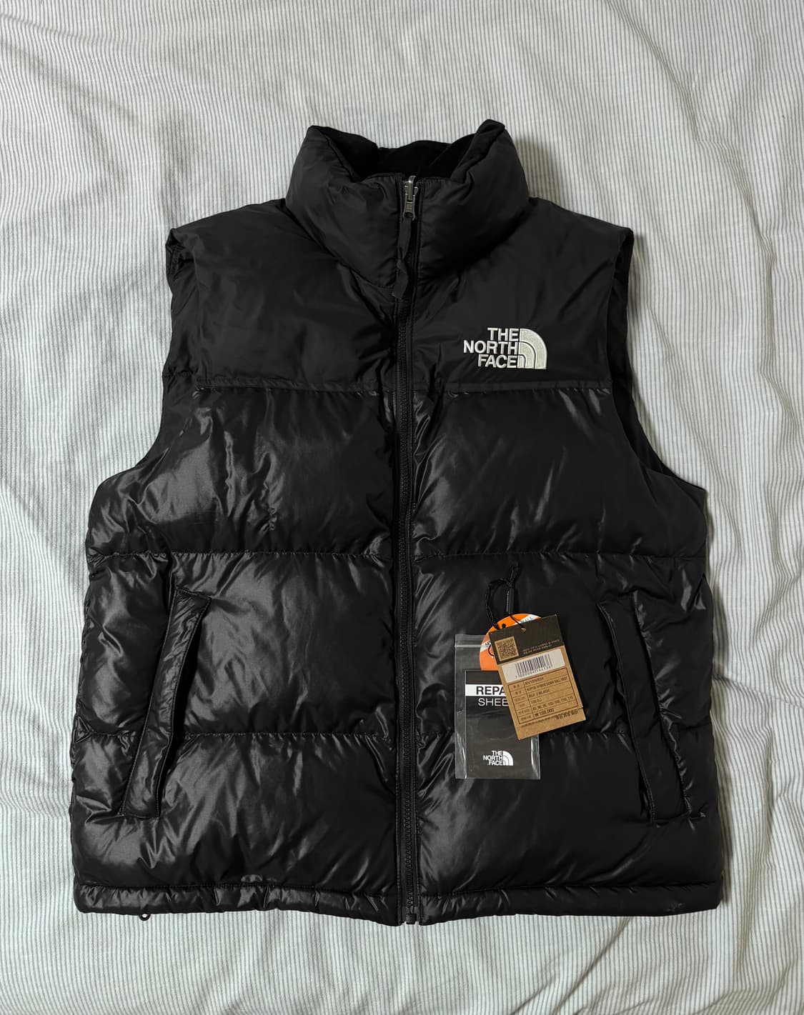 노스페이스 눕시 하이브리드 다운 볼 베스트 블랙 상품이미지1