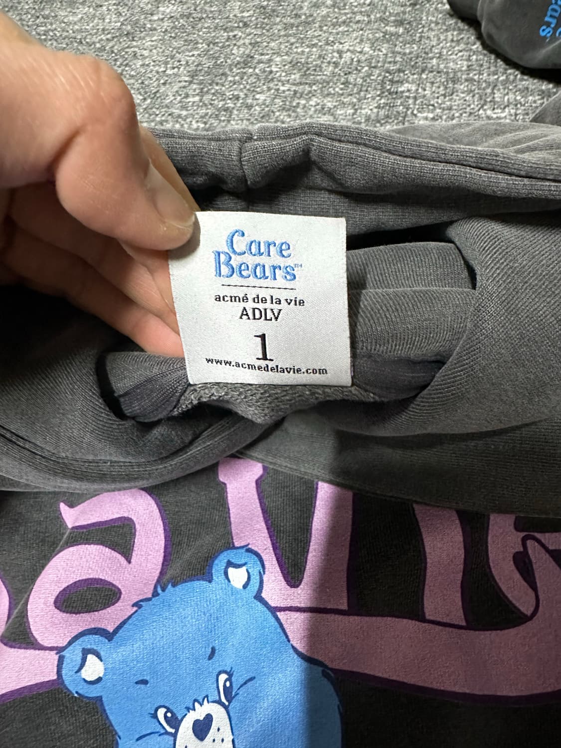 아크메드라비 케어베어 콜라보 후드티 블랙 상품이미지3