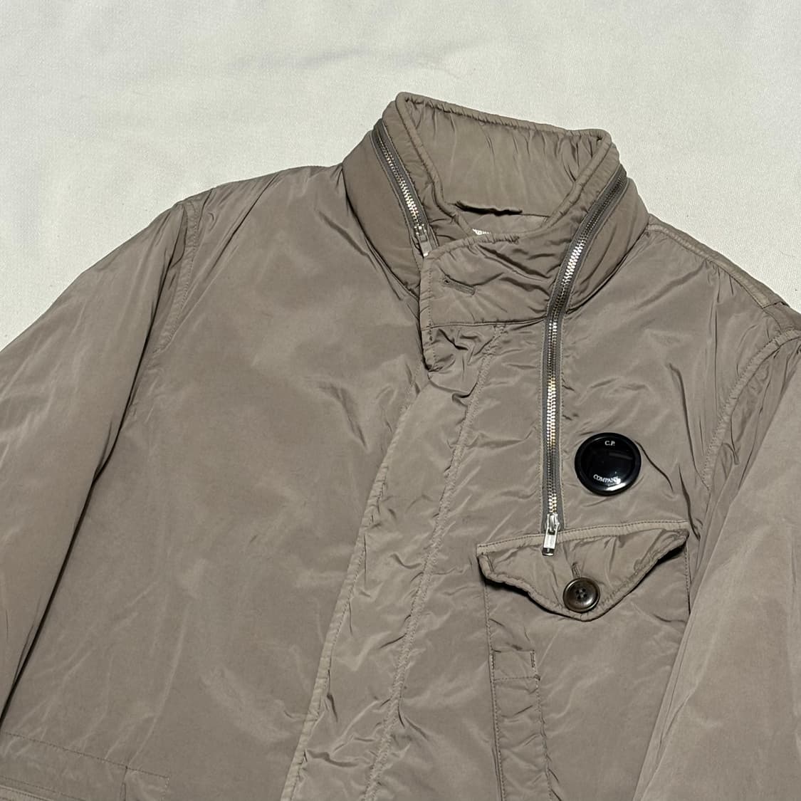 105 씨피컴퍼니 NYCRA 스트레치 나일론 쉘 자켓. 상품이미지1