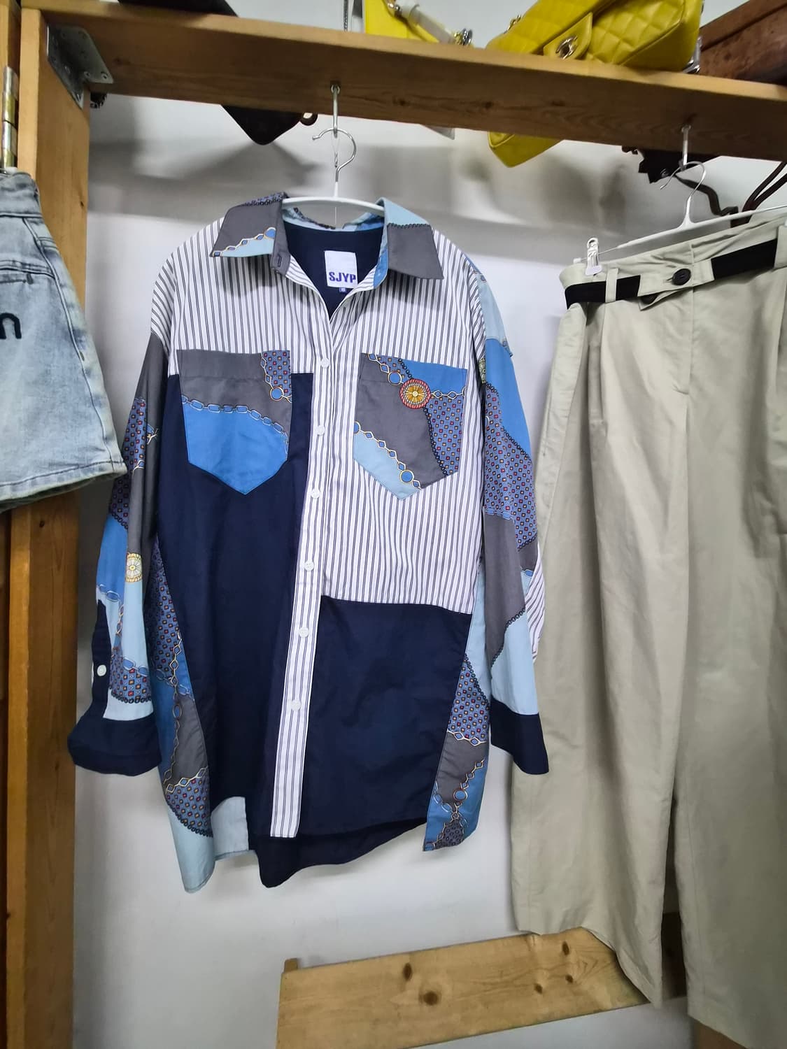 SJYP 언발 유니크셔츠 상품이미지1