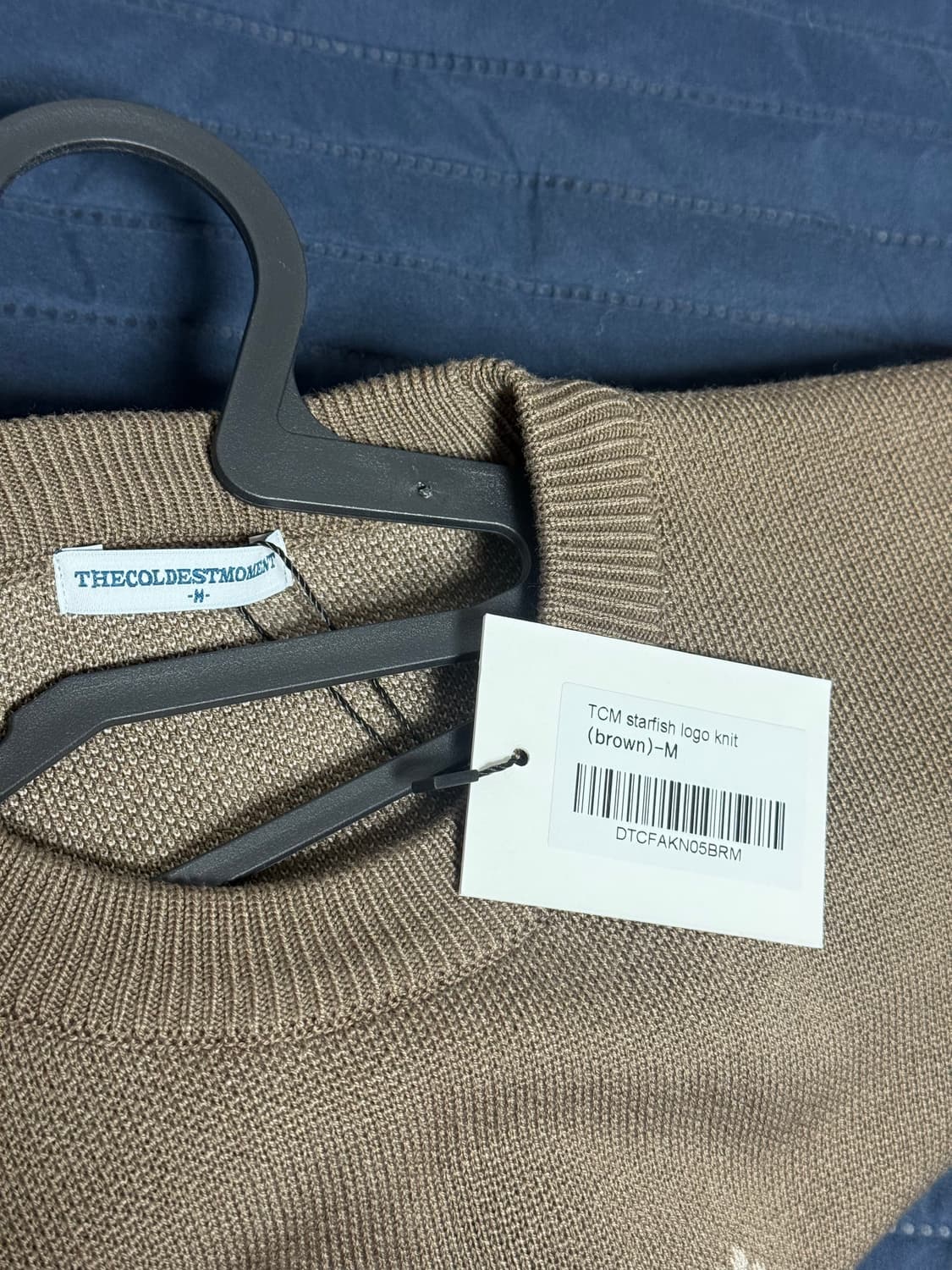 [새상품] 더콜디스트모먼트 불가사리 로고 니트 상품이미지3