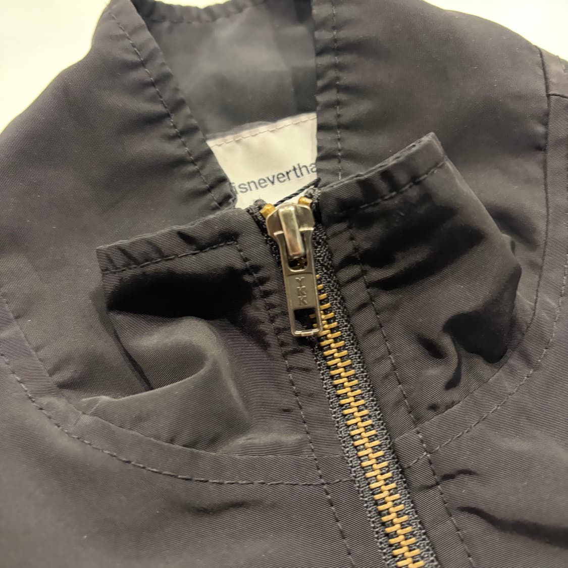 [M] 디스이즈네버댓 인터네셔널 빅로고 블랙 바람막이 D718 상품이미지5