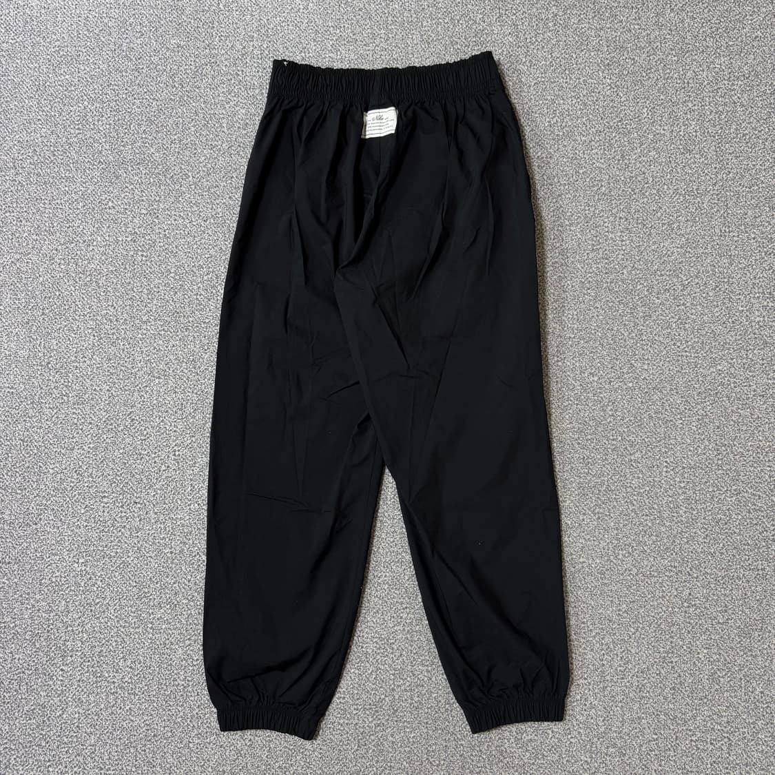 나이키 우븐 바람막이 조거팬츠 여성용 상품이미지2