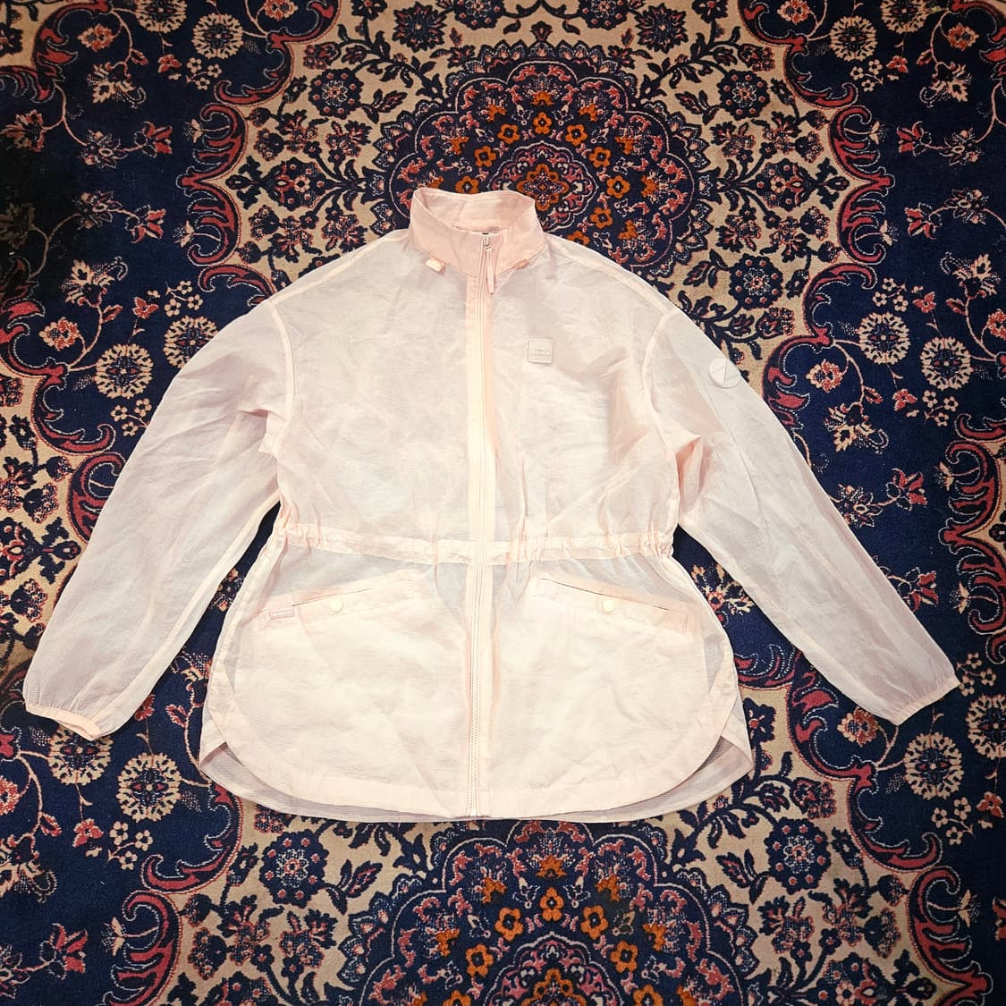 아이더(Eider) 23ss 핑크 허리 스트렙 초경량 바람막이 상품이미지1