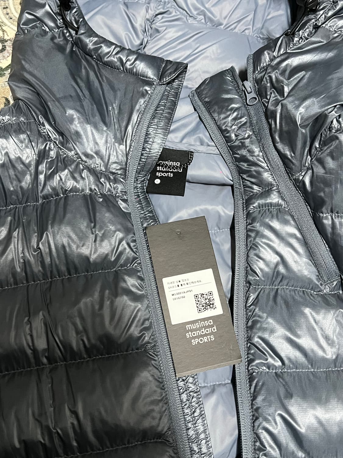 무신사 스탠다드 탱커 라이트 벤트 패딩 자켓 라지 팝니다 상품이미지3