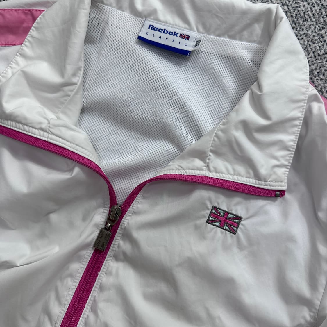리복(Reebok) 화이트 핑크 바람막이 상품이미지3