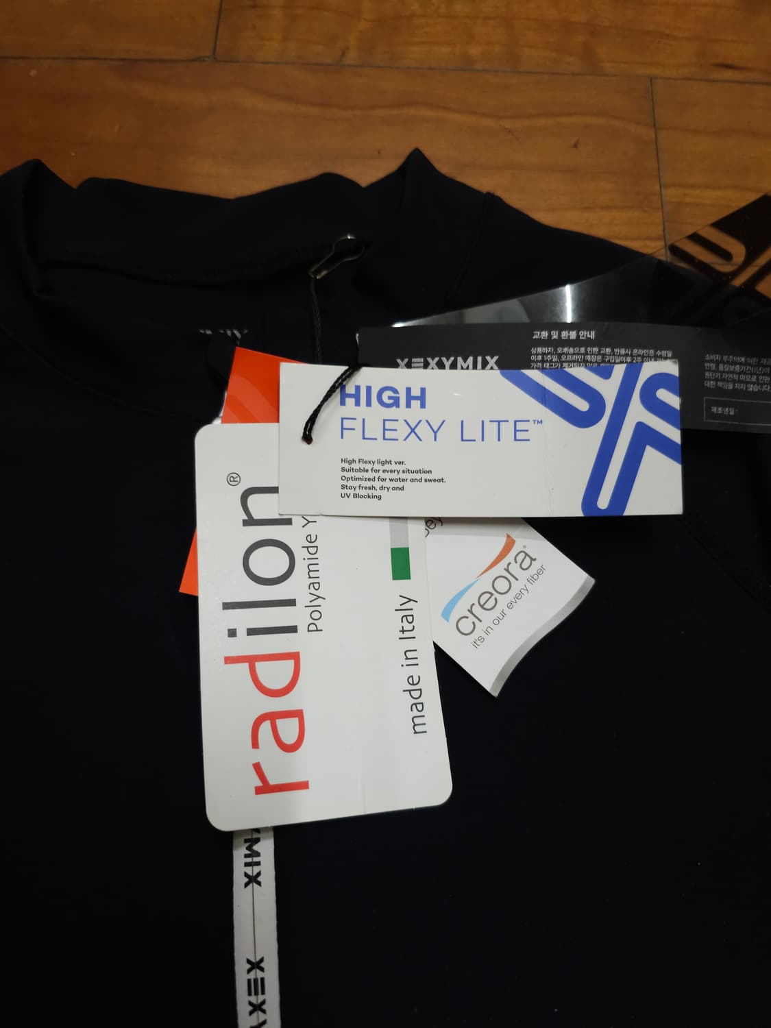 새상품)젝시믹스 블랙 크롭 래쉬가드 XL 상품이미지5