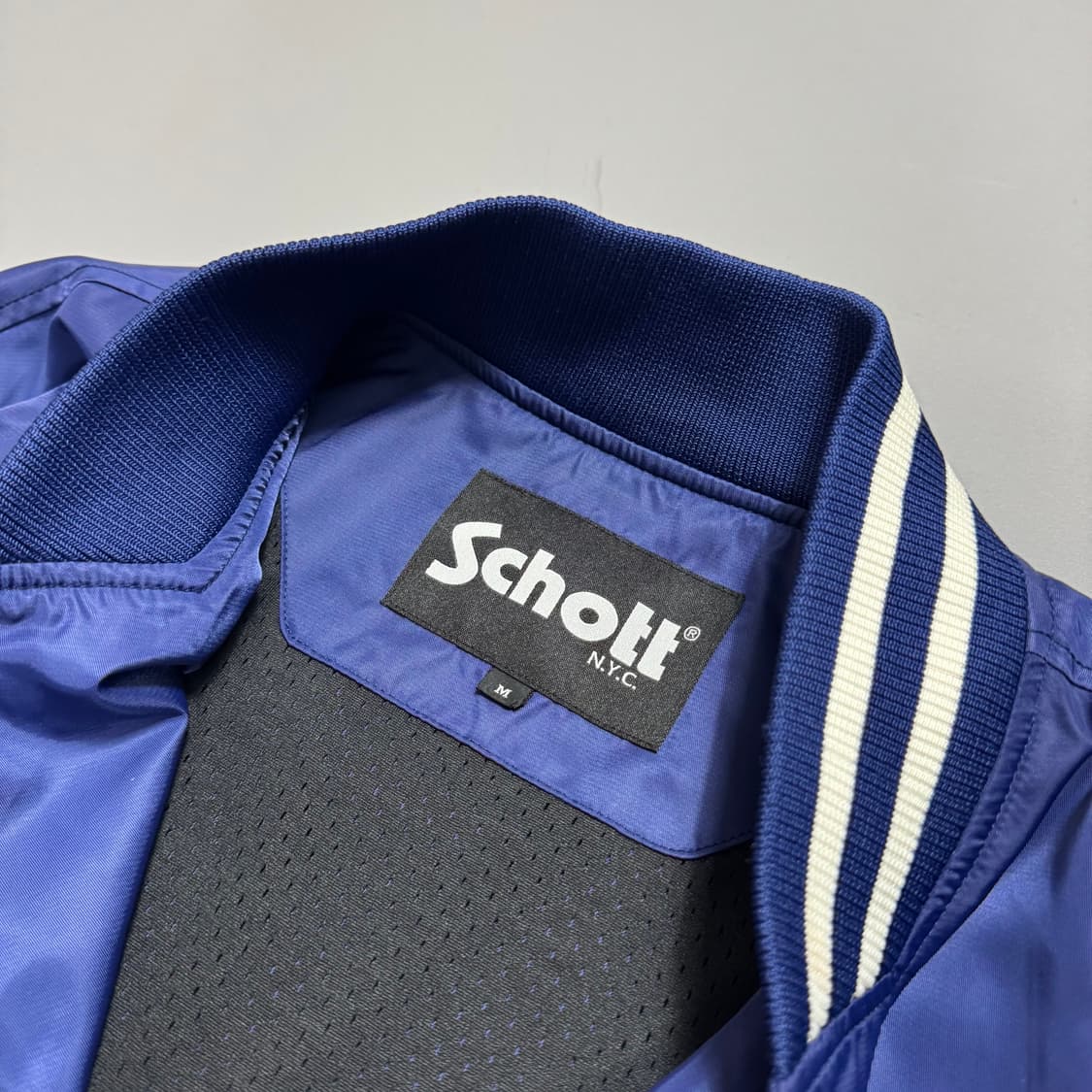 쇼트(Schott) 22ss 블루컬러 스펠링 로고 나일론 바시티 자켓 상품이미지3