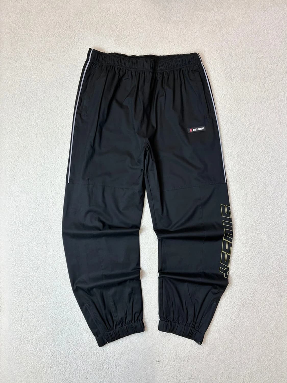 스투시 나일론 아이코닉 트랙 팬츠 PN6135 상품이미지1