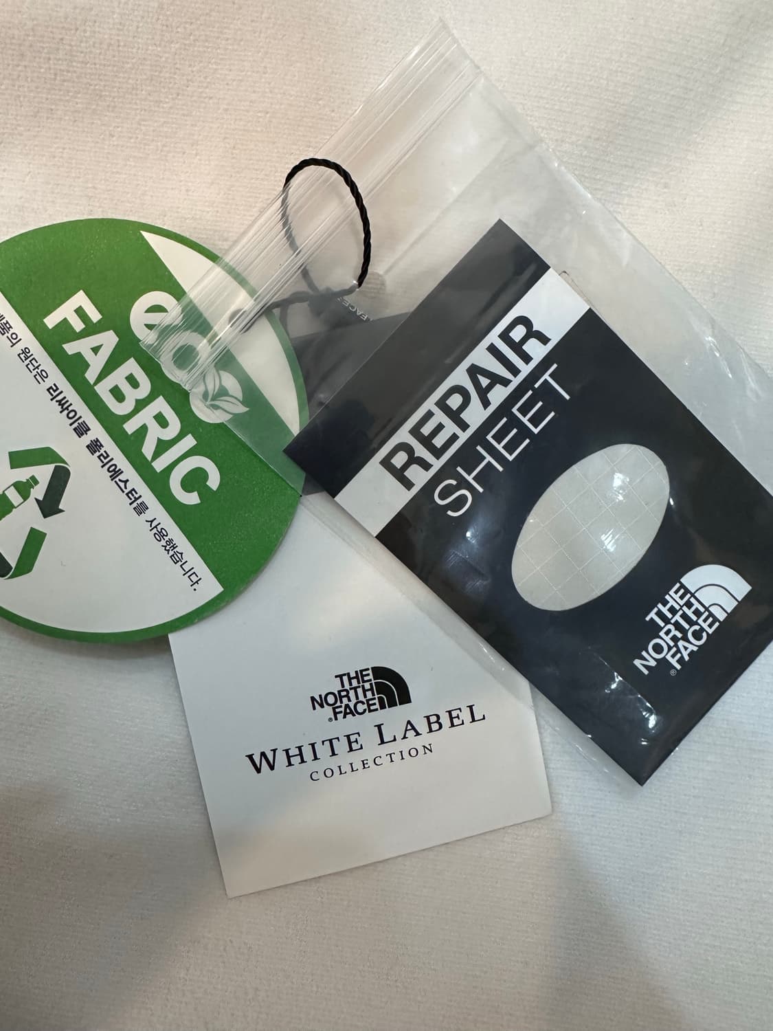 노스페이스 화이트 라벨 노벨티 눕시 다운 베스트 크림95M 상품이미지4