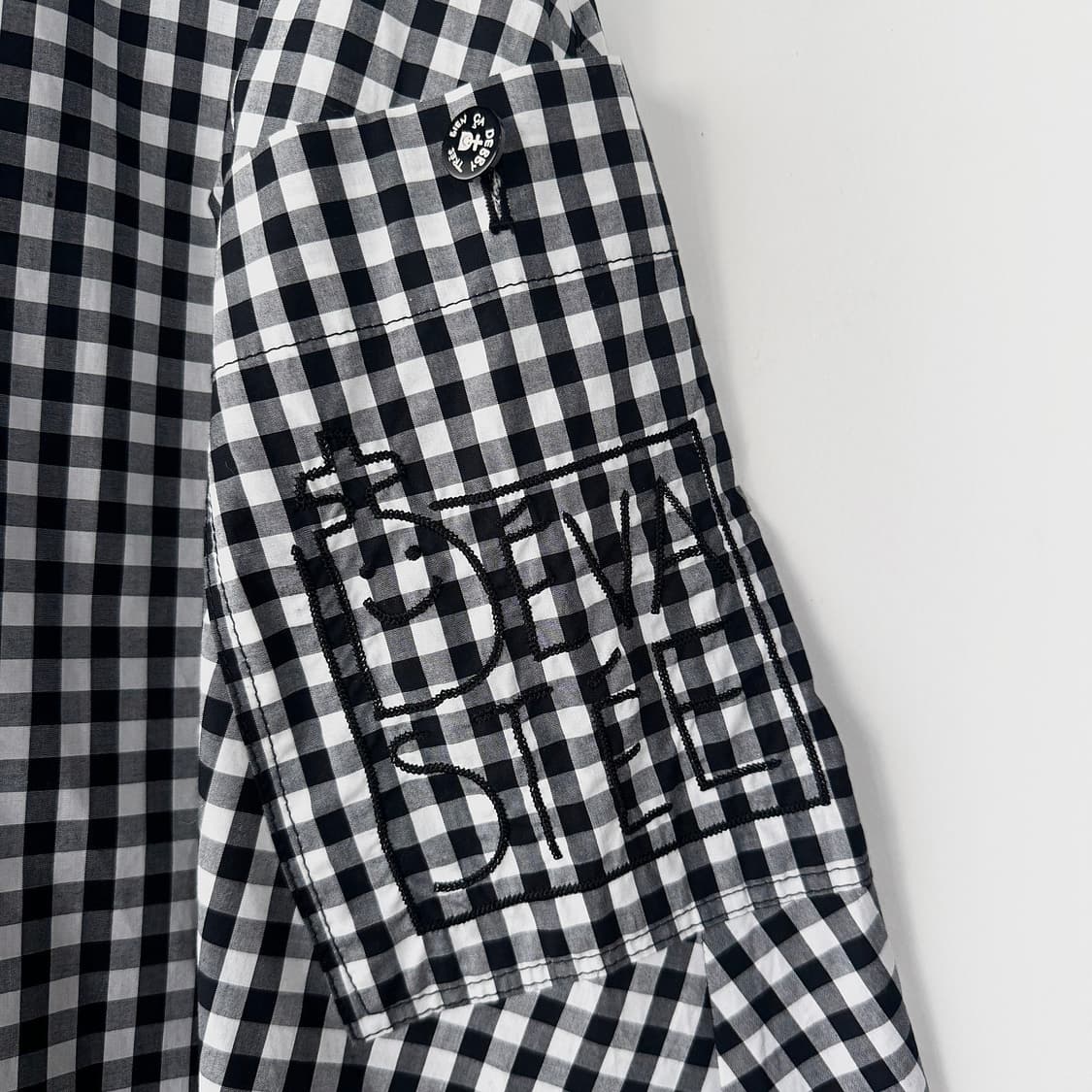 데바스테 23 로고 언발 체크 스커트 상품이미지2