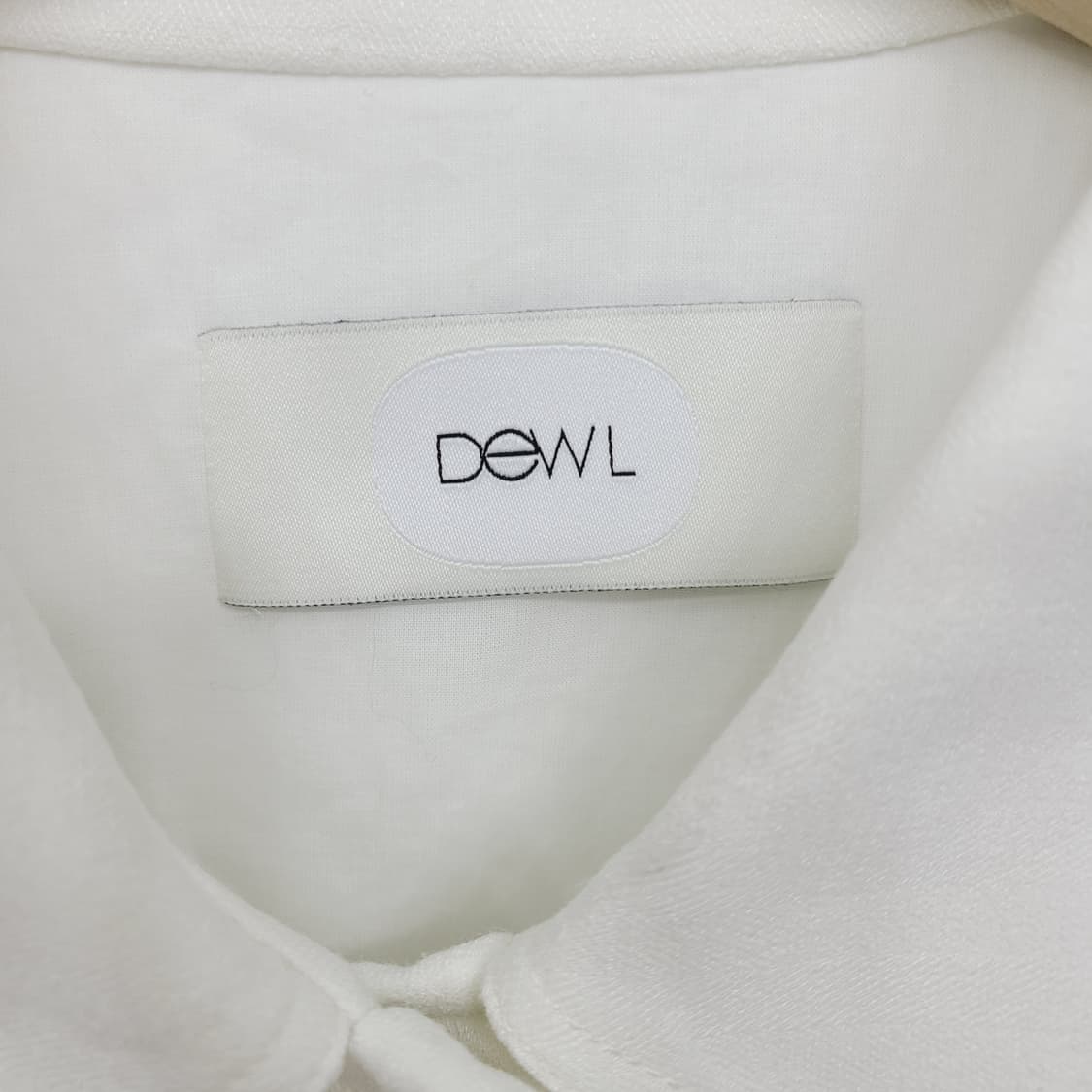 듀엘(DEWL) 화이트 보석 버튼 크롭 자켓 (66) 상품이미지6