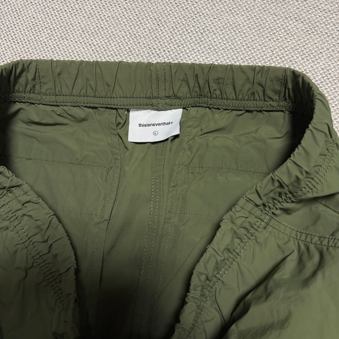 디스이즈네버댓 카키색 나일론 조거팬츠 상품이미지3
