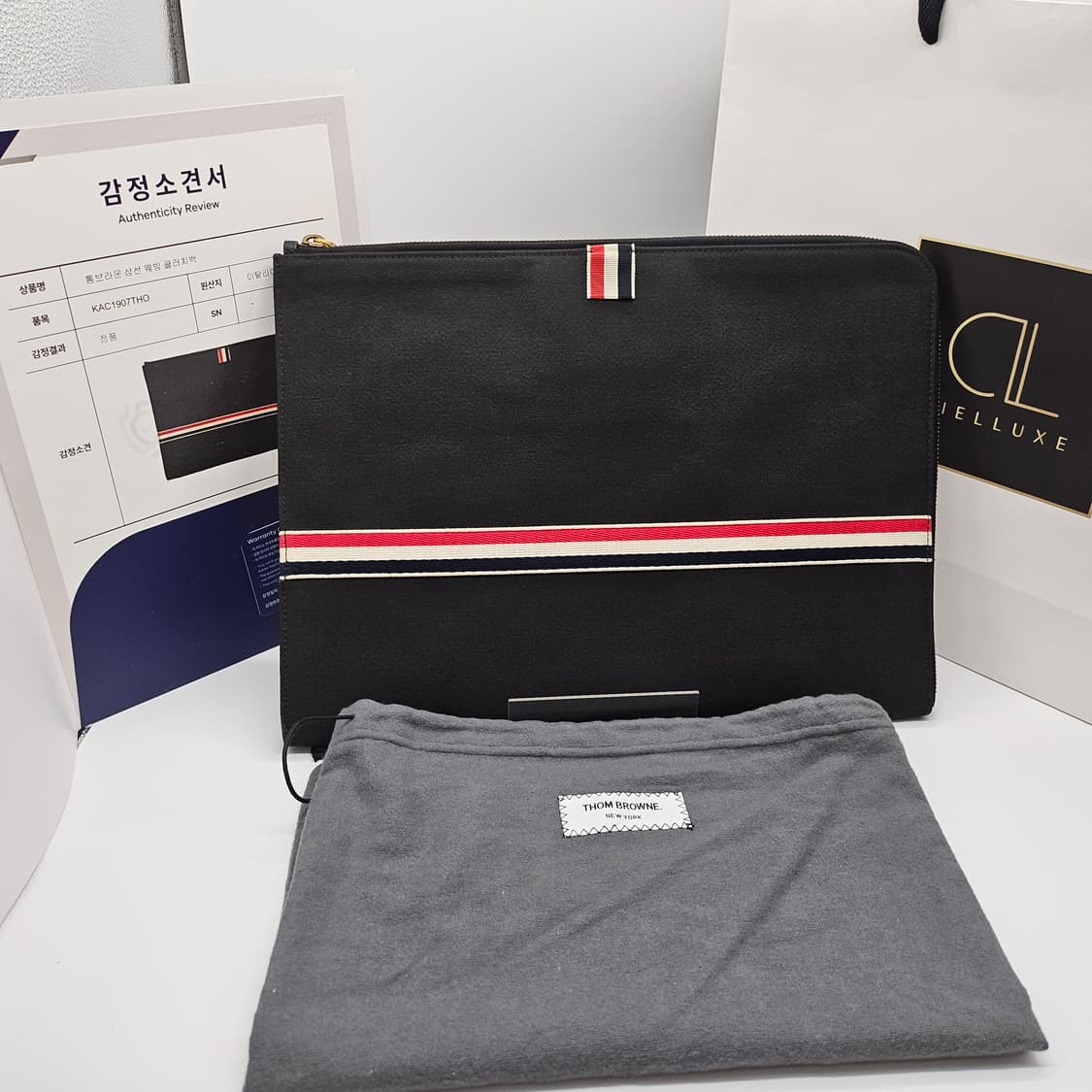 정품 톰브라운 패브릭 클러치백 상품이미지1