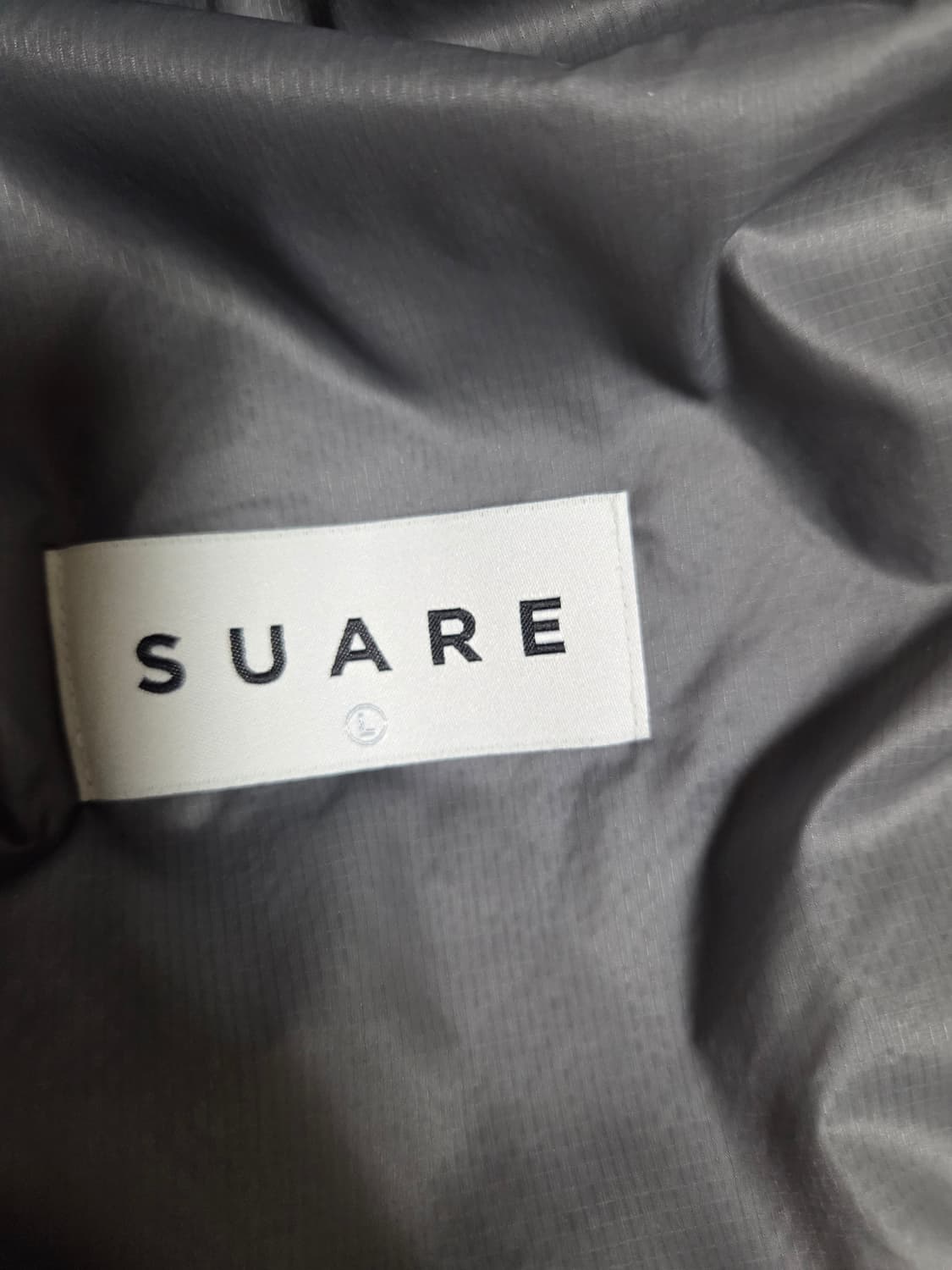 수아레 경량패딩 팝니다 상품이미지3