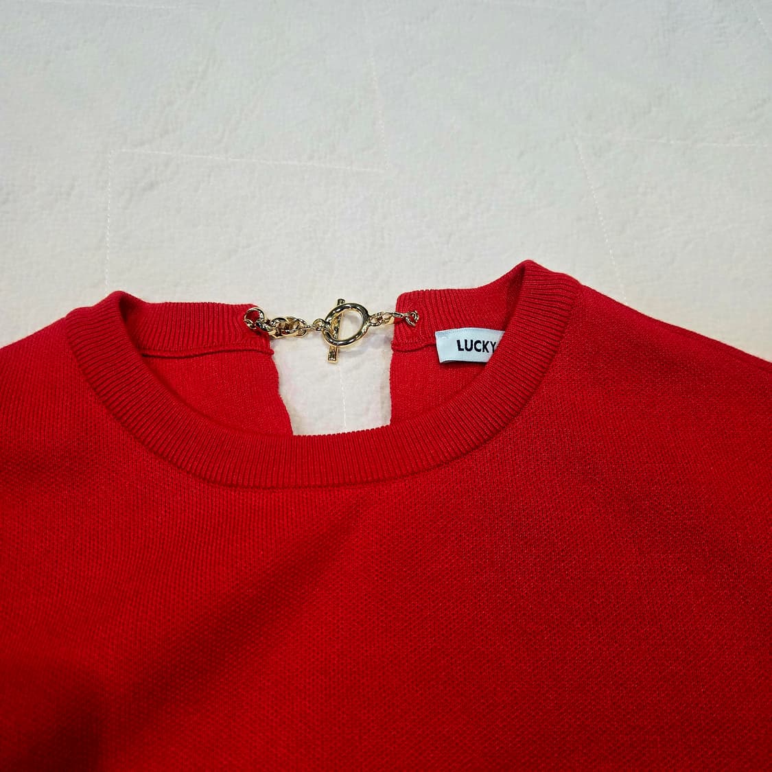 럭키슈에뜨 뒷체인 니트  상품이미지3