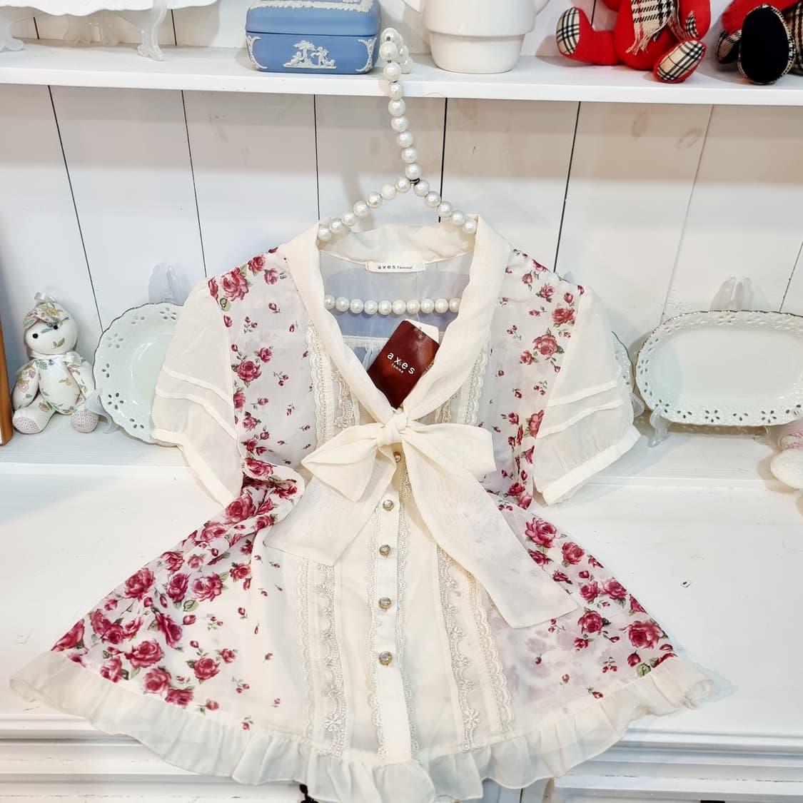 엑시즈팜  시스루 리본타이 프릴 블라우스 상품이미지1